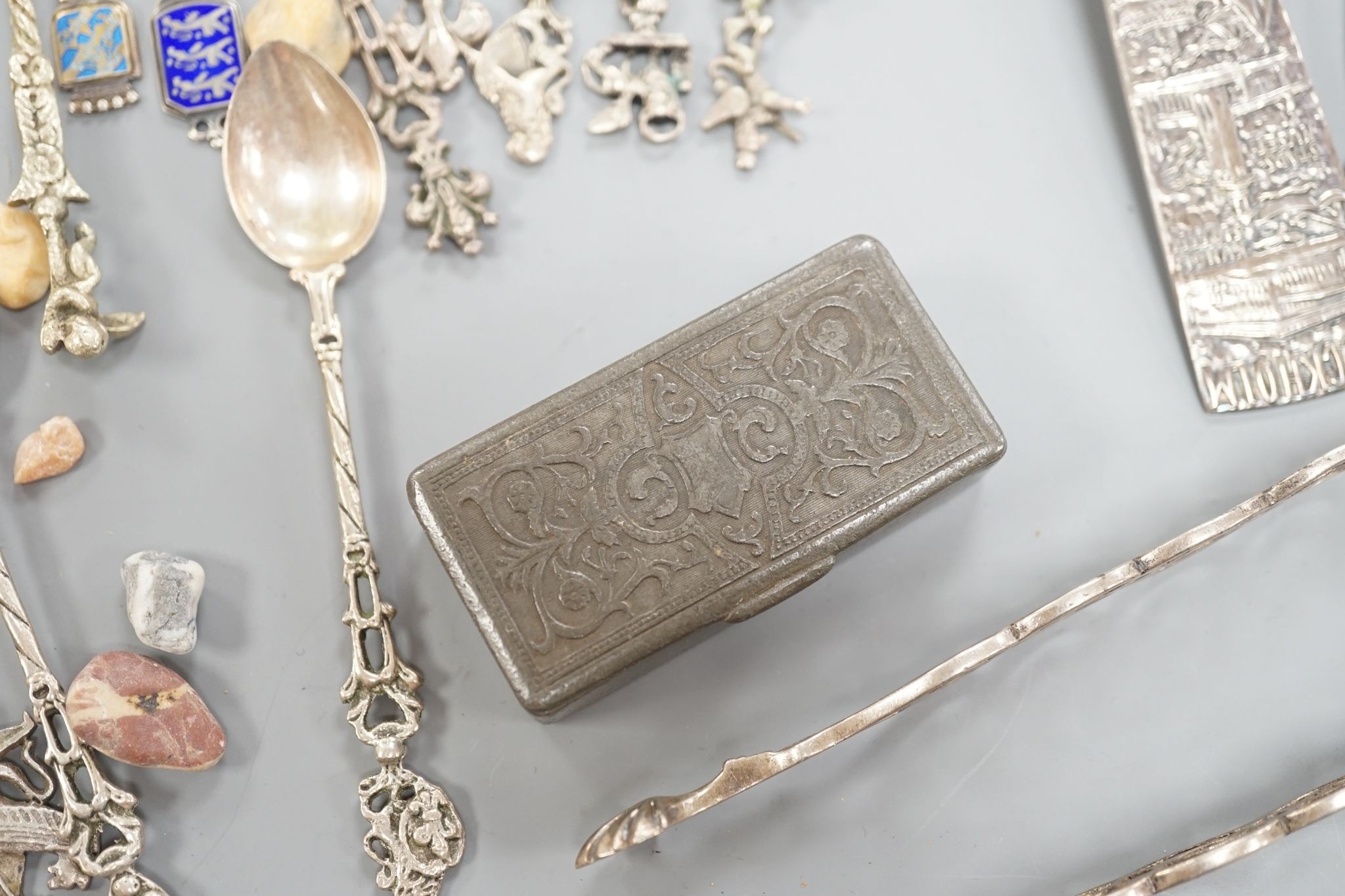 A Georg Jensen & Wendel A/S sterling small spoon, 10.2cm, a pair of antique silver sugar tongs(a.f.), a metal snuff box and a small group of minor spoons including continental white metal.